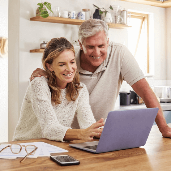 Man and woman at a laptop