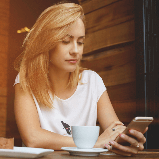 woman making payment on phone